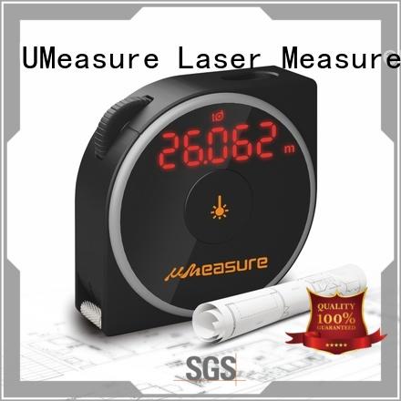 UMeasure carrying laser measuring devices backlit for worker